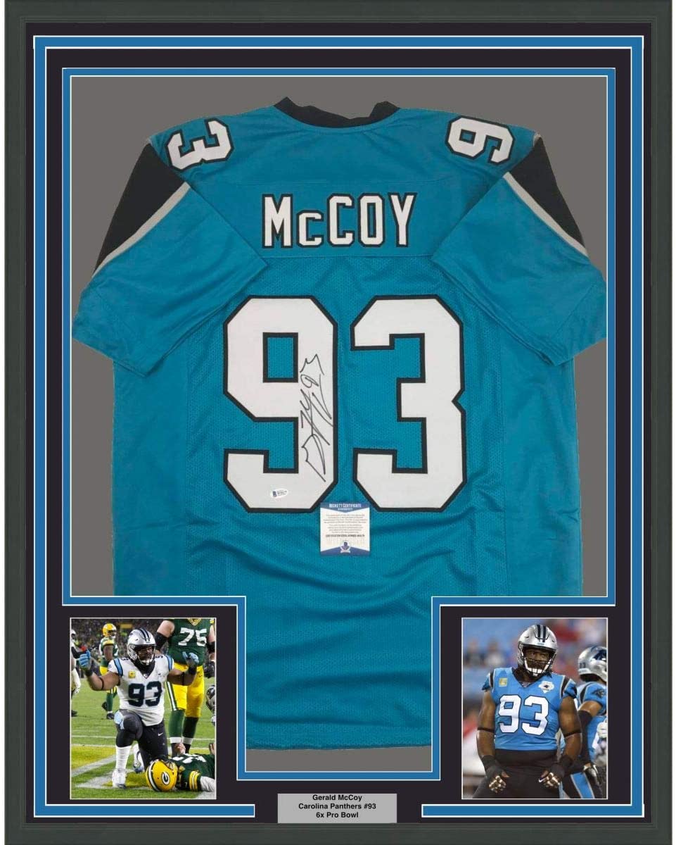Framed Autographed/Signed Gerald McCoy 35x39 Carolina Blue Football Jersey Beckett BAS COA