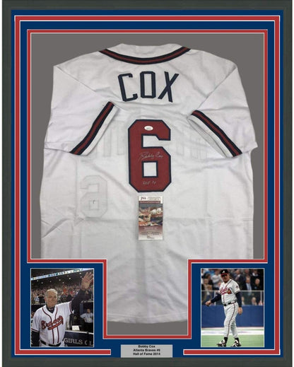 Framed Autographed/Signed Bobby Cox HOF 14 35x39 Atlanta White Baseball Jersey JSA COA