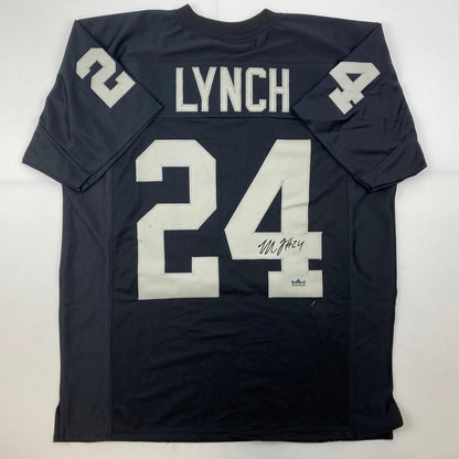Facsimile Autographed Marshawn Lynch Oakland Las Vegas Black Reprint Laser Auto Football Jersey Size Men's XL